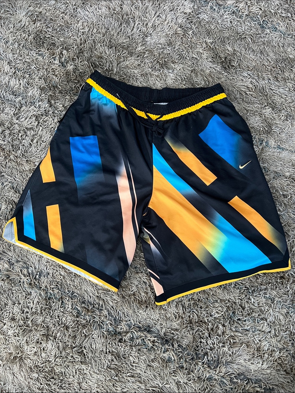 Nike: Men’s Black Athletic Shorts with Blue & Yellow Graphic